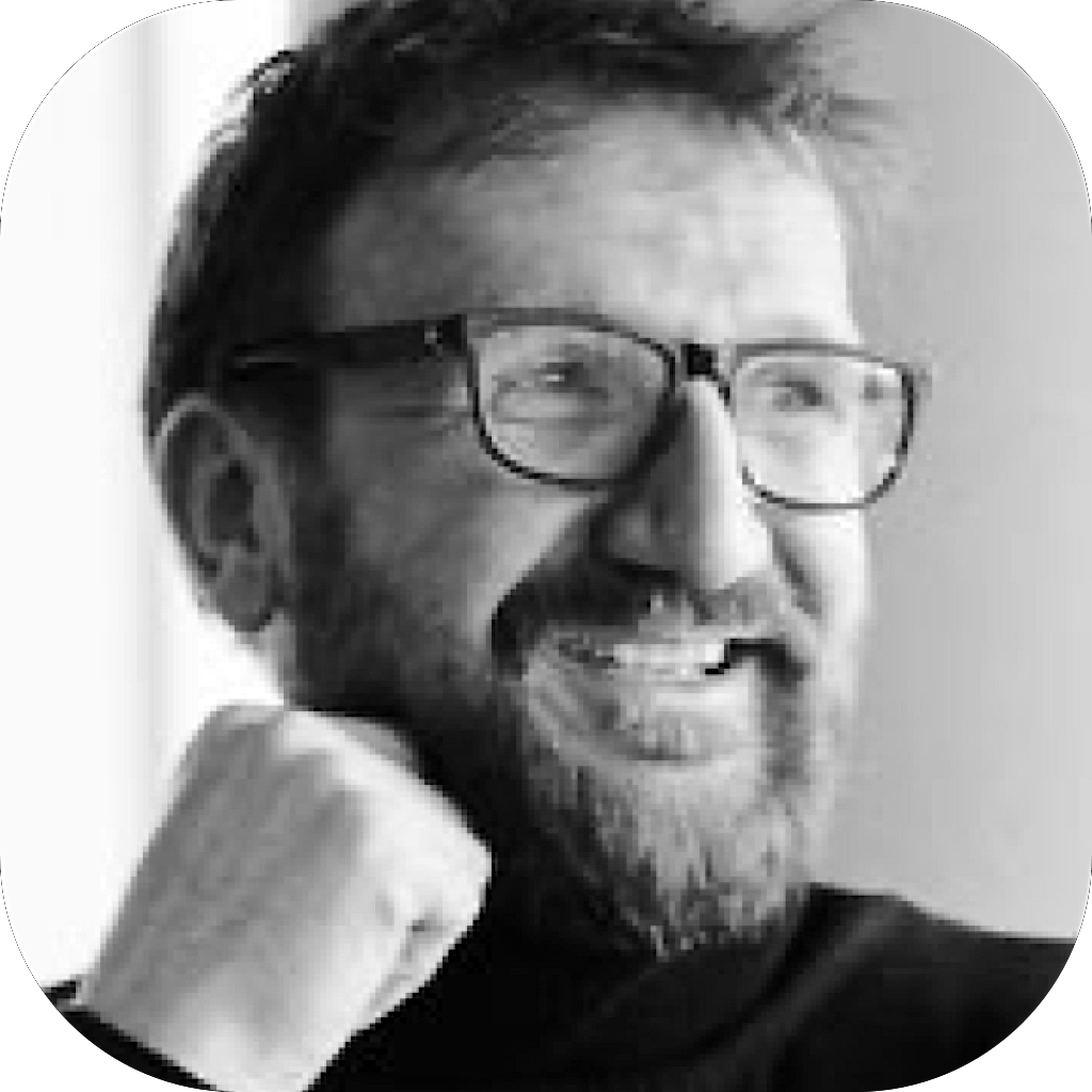 Black-and-white portrait of Ralf M. Mendle